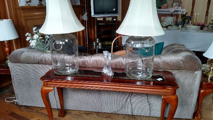 Sofa table with queen ann legs and glass inserts. 2 large lamps each with a hole for displaying a grouping of your favorite things like shells, floral or decor balls
