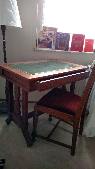 Vintage Secretary with chair. Has green leather top on wheels