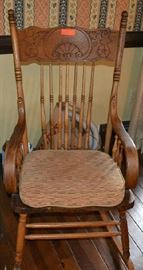 Lot 8:   Lot of 2 items:  Includes antique oak pressed back rocker with bentwood arms, detached cushion (42"h x 22"w x 26"d) and standing full-length swivel mirror (62"h x 25"w x 21"d)
