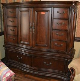 Lot 9: Oversized wardrobe with 8 drawers and one cabinet on top and two deep drawers on bottom, reeded bun feet (matches Lot #2); 64"h x 64"w x 24"d
