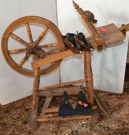 Lot 20: Lot includes antique spinning wheel (28"h) with two antique carders and two decorative vintage irons, candlestick made from weave shuttle
