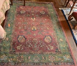 Lot 23: Persian style 4'x6' rug with rust, blue, green by Kharma
