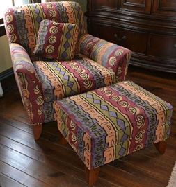 Lot 51: Contemporary multi-colored club chair (34"h x 35"w x 35"d) and ottoman made by Norwalk (59)
