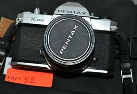 Lot 52: Pentax 35mm camera with flash and additional lens, comes with case
