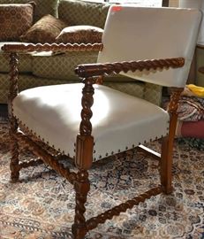 Lot 56: Jacobean style library chair, upholstered in white leather with brass nail trim, 34"h x 24"w x 19"d (25)

