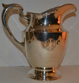 Lot 104: Sterling silver water pitcher, monogramed, marked "Sterling 506B", maker illegible, 9"h, 20.149 toz., dent near spout (11)
