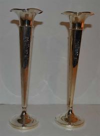 Lot 107:  Sterling silver pair of bud vases, monogrammed with flared rims, weighted bases, 8"h, by A.M. Soffel Co. Inc. "marked #111 weighted" (13)
