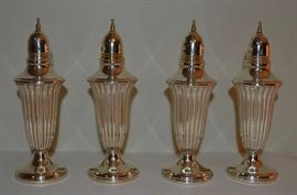 Lot 112:  2 sets of sterling silver salt/peppers, marked Revere Silver Co. #105, 5.75"h, matches pair of candlesticks lot #111.  (12)
