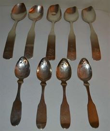 Lot 120: 2 sets of coin silver spoons:  consists of 4 teaspoons by "J.Brown", and 5 "WH" coin silver serving spoons, all are worn and damaged to bowls, 7.84 toz. 
