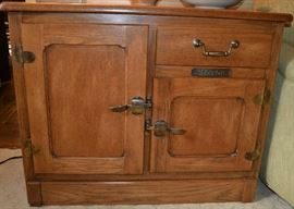 Lot 216: Oak Wash stand with cabinet and two drawers; 28"h x 36"w x 16"d, with "Victor" metal plaque, piece probably made as a kit (62)
