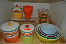 Lot 306: Lot includes three matching canisters, vintage nesting Pyrex mixing bowls, and more
