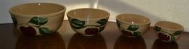 Lot 322: Set of Watt nesting bowls in an apple pattern 
