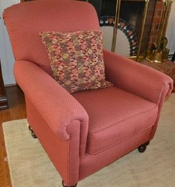 Lot 402: Upholstered club chair in good condition, burgundy upholstery with ivory dots, maker unknown; 39"h x 35"w x 37"d
