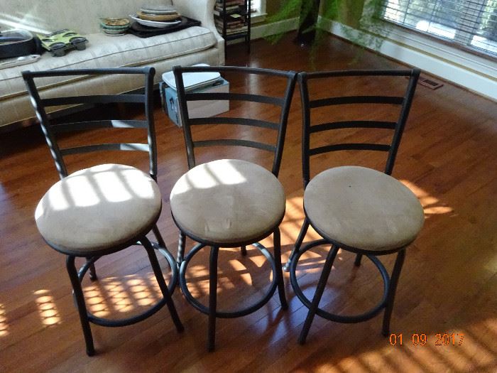 Beautiful three metal chairs with suede cushion seats