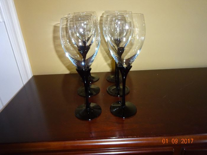 Stunning wine glassware with dark black stems