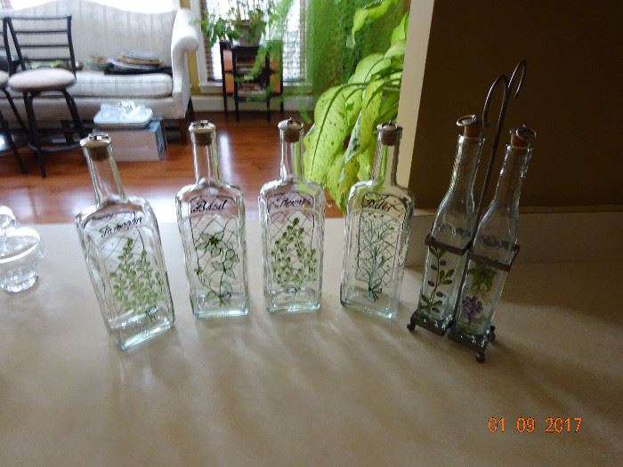 Vintage oil and vinegar set with set holder and four vintage glass bottles
