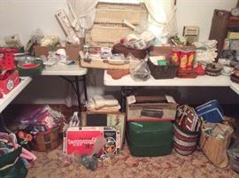 vintage suitcase holding more thread, various kinds, another radio cassette player, new in box, vintage green stool, old games, cards, game yaccessories, full baskets of various crochet & knit items including hand made pot holders, etc.