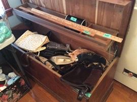 Vintage cedar chest in good condition with purses of all brands/sizes inside. Vintage yard sticks too