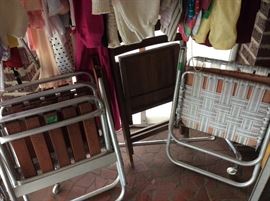 Vintage wooden/metal lawn chairs, another wood lawn chair, and webbed lawn chair