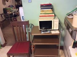 Vintage 3 tier shelf in bronze, old wooden chair in great condition, Conair Micro-Mini, Cookbooks & newspaper recipes in album.