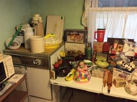 Sunbeam mixmaster with lots of accessories, crock, 2 rolling pins, various kitchen appliances etc
