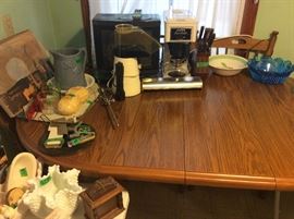 Oval wood table with chairs to match