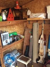 Storage building 2 - ceramic heaters, metal stool, fans, carpet sections & more