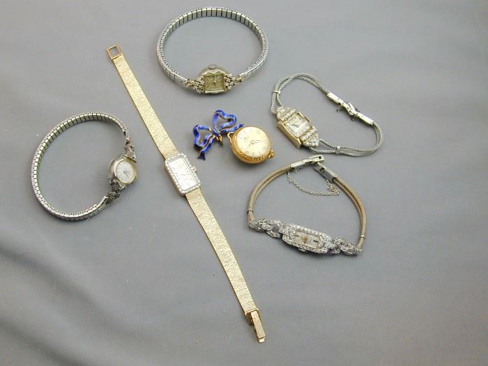 Assorted gold & platinum diamond watches and Bucherer skeleton back orb/ball watch.