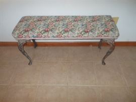 Cast metal upholstered bench