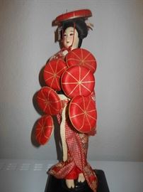 Vintage music box doll