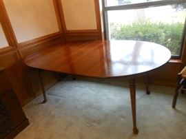 Round to oval dining table