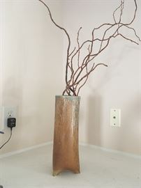 Decorative vase and branches.