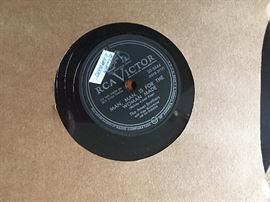 Set of Ames brothers vintage records in flip leaf album.