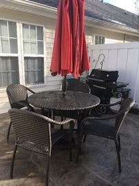 Patio table with four chairs.