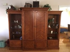 Klaussner furniture tv armoire and display cabinets.