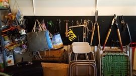 Garden tools, folding chairs, and some hand tools.