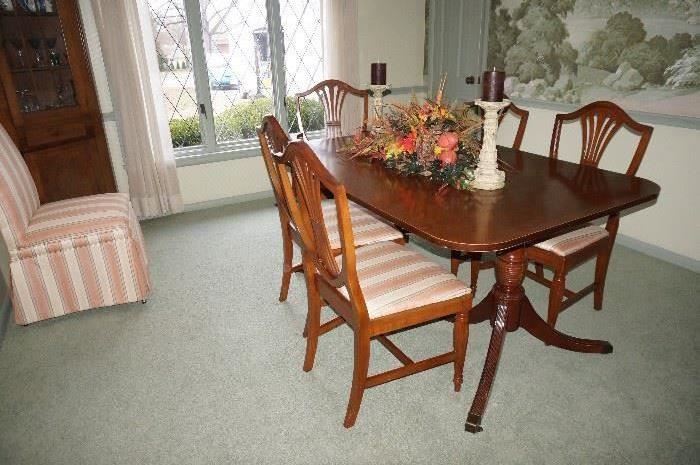 double pedestal dining room table, 2 captain's chairs, 4 chairs, 2 additional matching side chairs