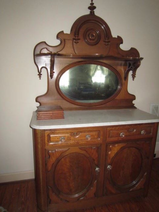 Victorian walnut buffet with marble top.  The box on top is not part of the server.