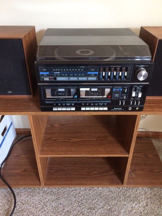 another stereo system with speakers, shelving