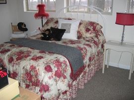 Double bed with headboard and all linens. 2 lamps with red shades