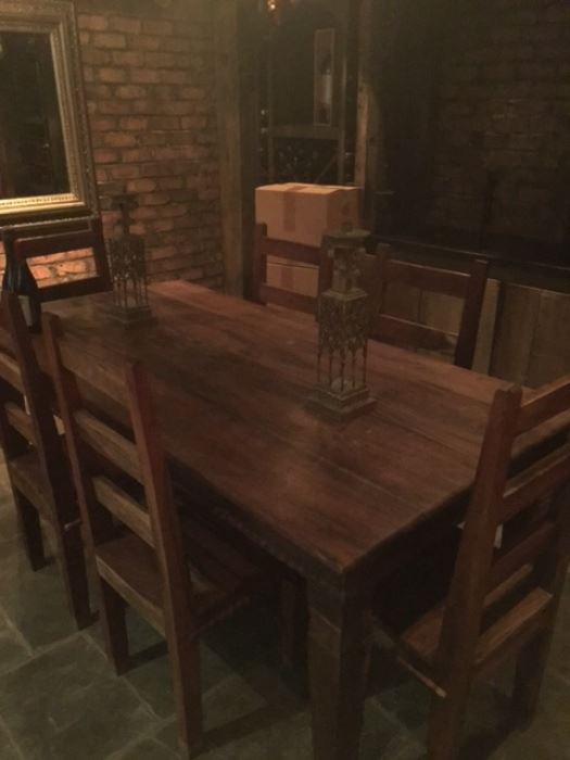 Rustic wine cellar table and chairs