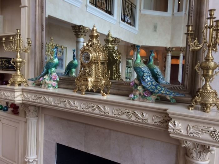 Italian brass clock with matching candelabra and porcelain peacocks