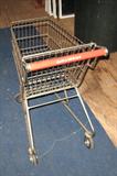 Child size genuine metal shopping cart.