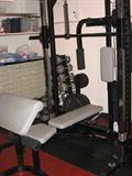 Smith Machine with Pec Deck, Lat Pull Down and Weight Stack.