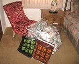 Hand-made afghans with bedspreads.