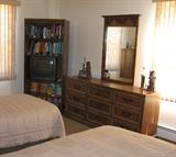 Bedroom set with matching twin beds.