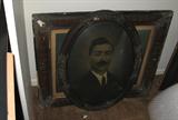 Antique convex frame with other antique frames, antique photos included.