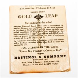 Package of Vintage 23K Gold Leaves: A package of vintage 23K gold leaves. The package was made by Hastings & Company and holds twenty-five XX Patent 23K leaves. The gold leaves used for gilding are in the original packaging.