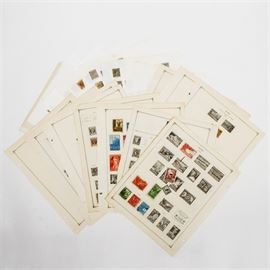 Collection of Postage Stamps From Cuba: A collection of postage stamps from Cuba. Includes stamps from the 1930s, 1940s, and 1950s featuring a variety of subjects.