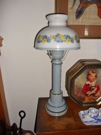 Baby blue tole lamp with glass shade
